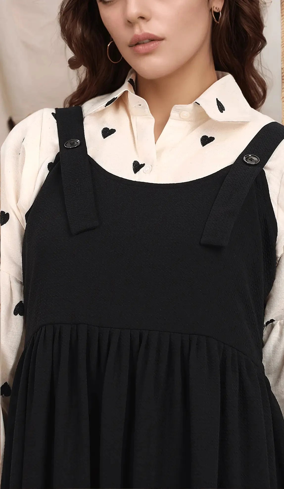 YEZWE Black and White Pinafore Dress featuring stylish adjustable straps and a flowing skirt