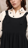 YEZWE Black and White Pinafore Dress featuring stylish adjustable straps and a flowing skirt