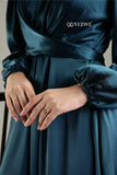 YEZWE blue satin flare modest gown with long sleeves and elegant waist belt