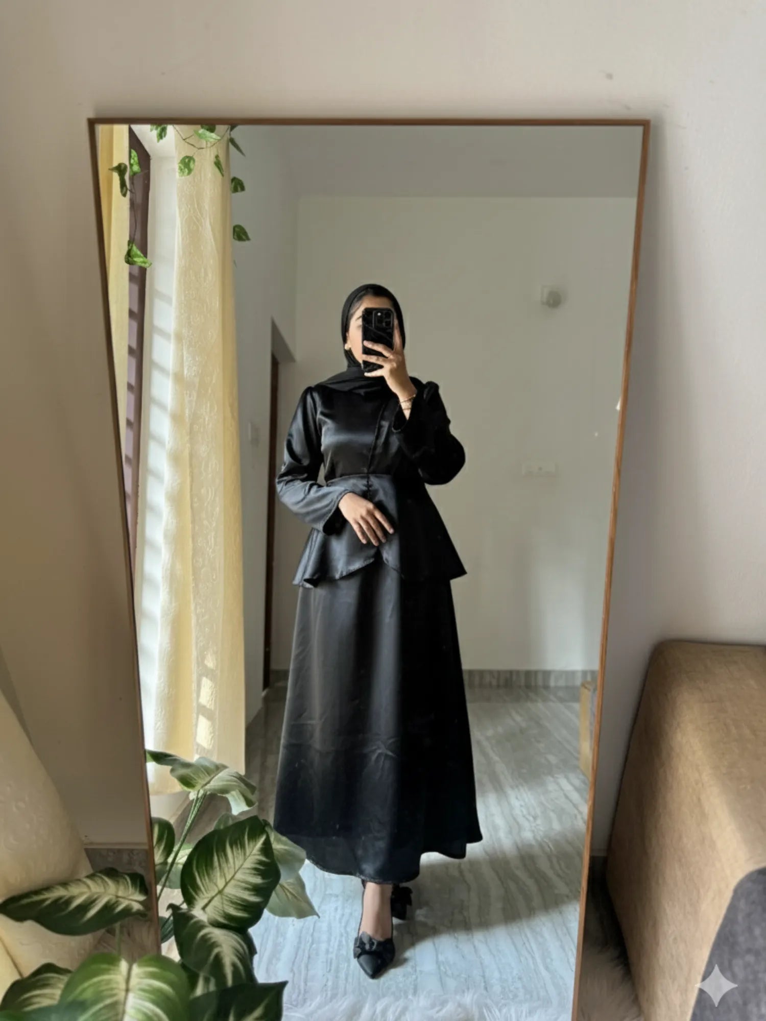 Yezwe Black Co-Ord Set featuring a peplum top and long skirt, perfect for stylish occasions