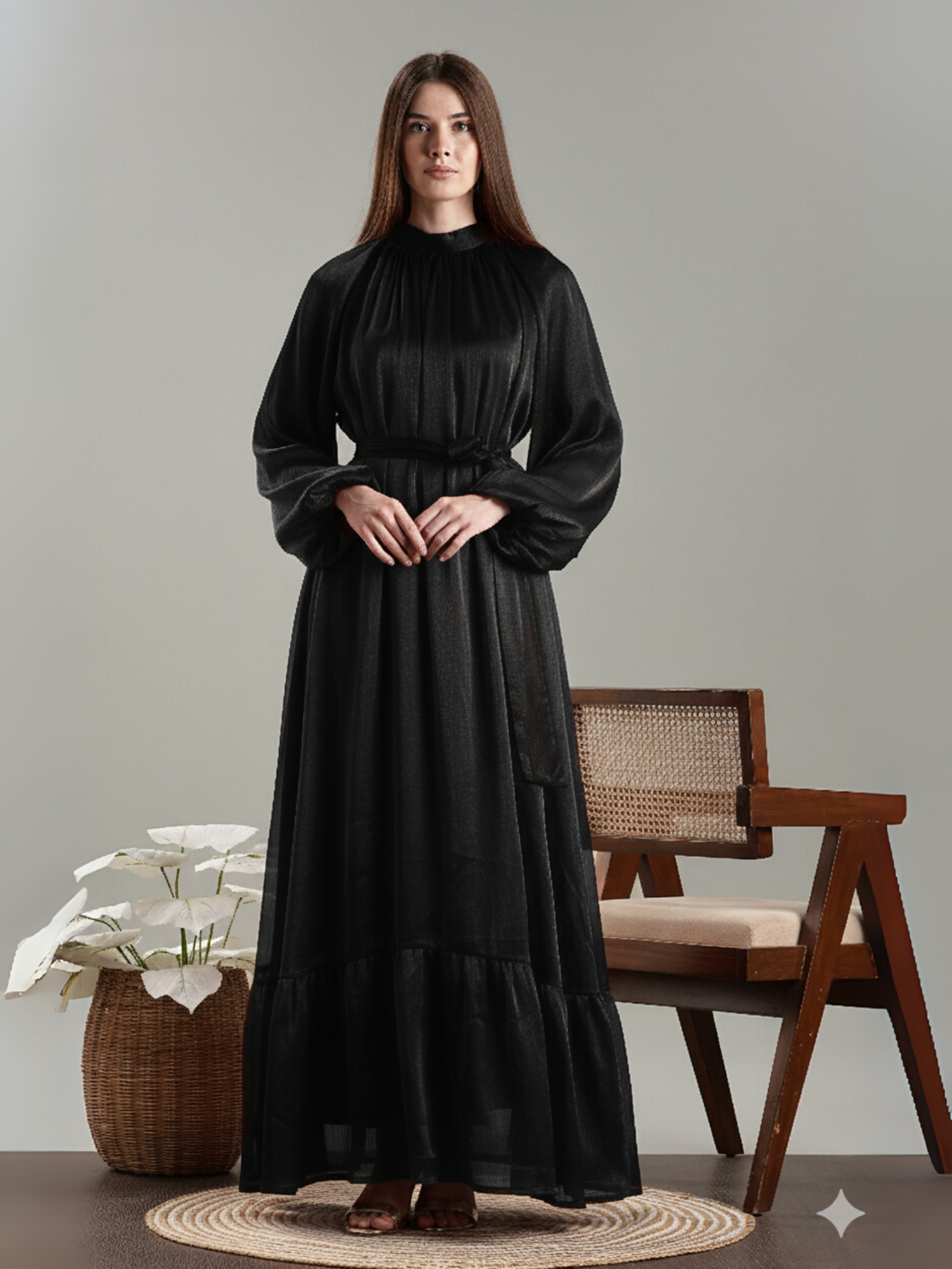 Elegant Yezwe Maxi Dress in black with long sleeves and a ruffled hem for a chic look