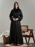 Elegant Yezwe Maxi Dress in black with long sleeves and a ruffled hem for a chic look