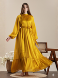 Yezwe Maxi Dress in vibrant yellow with long sleeves and ruffled hem for a stylish look
