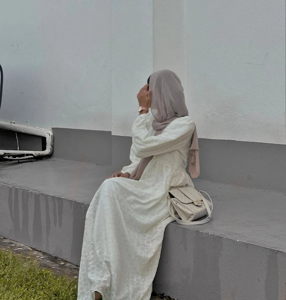 Modest off white maxi dress by Yezwe, featuring a flowing design and elegant silhouette