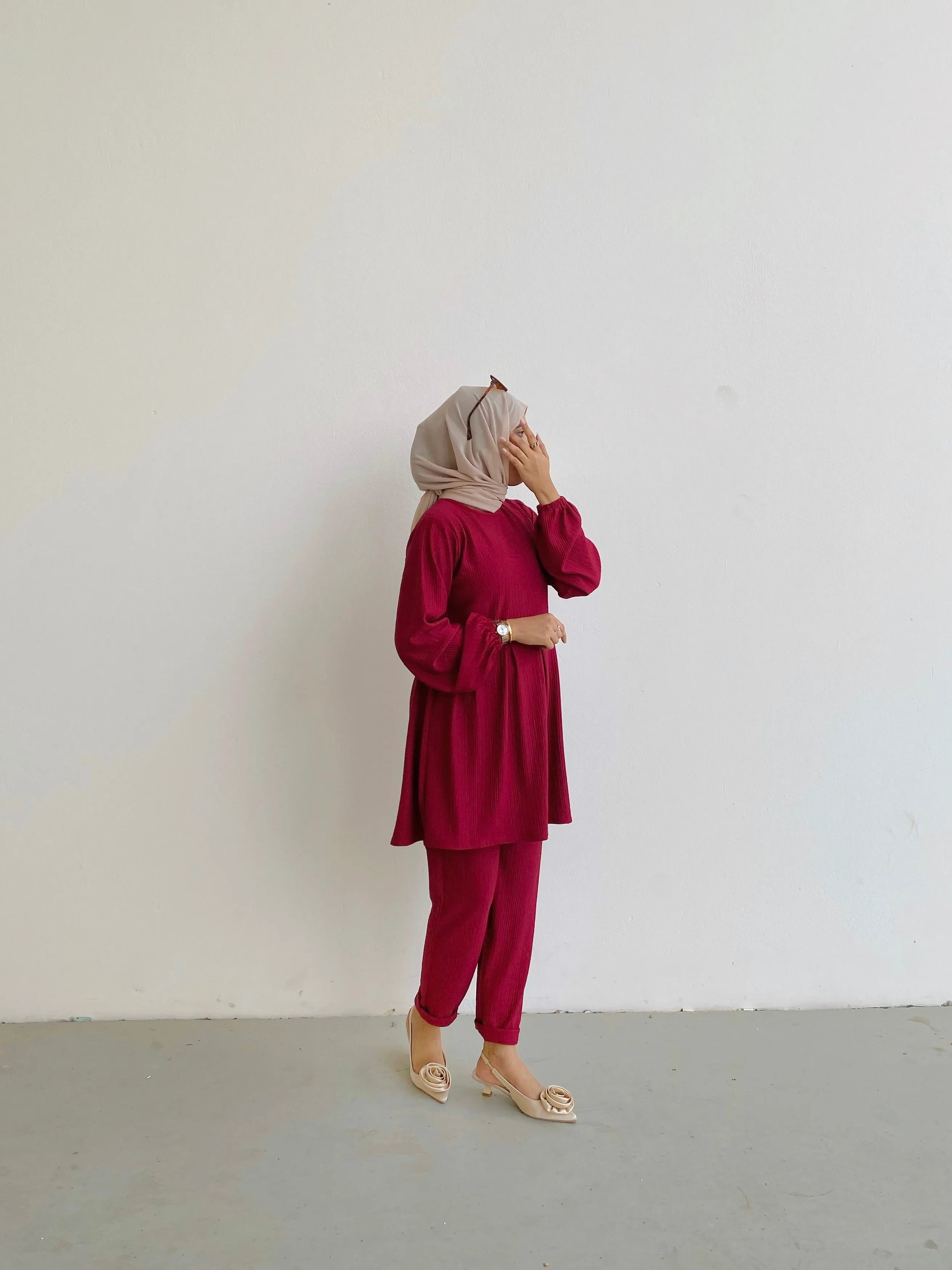 Modest textured rib co-ord set in burgundy featuring a long top and pants for a stylish look
