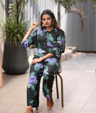 Yezwe modest wear jumpsuit in black with vibrant floral print, perfect for stylish comfort
