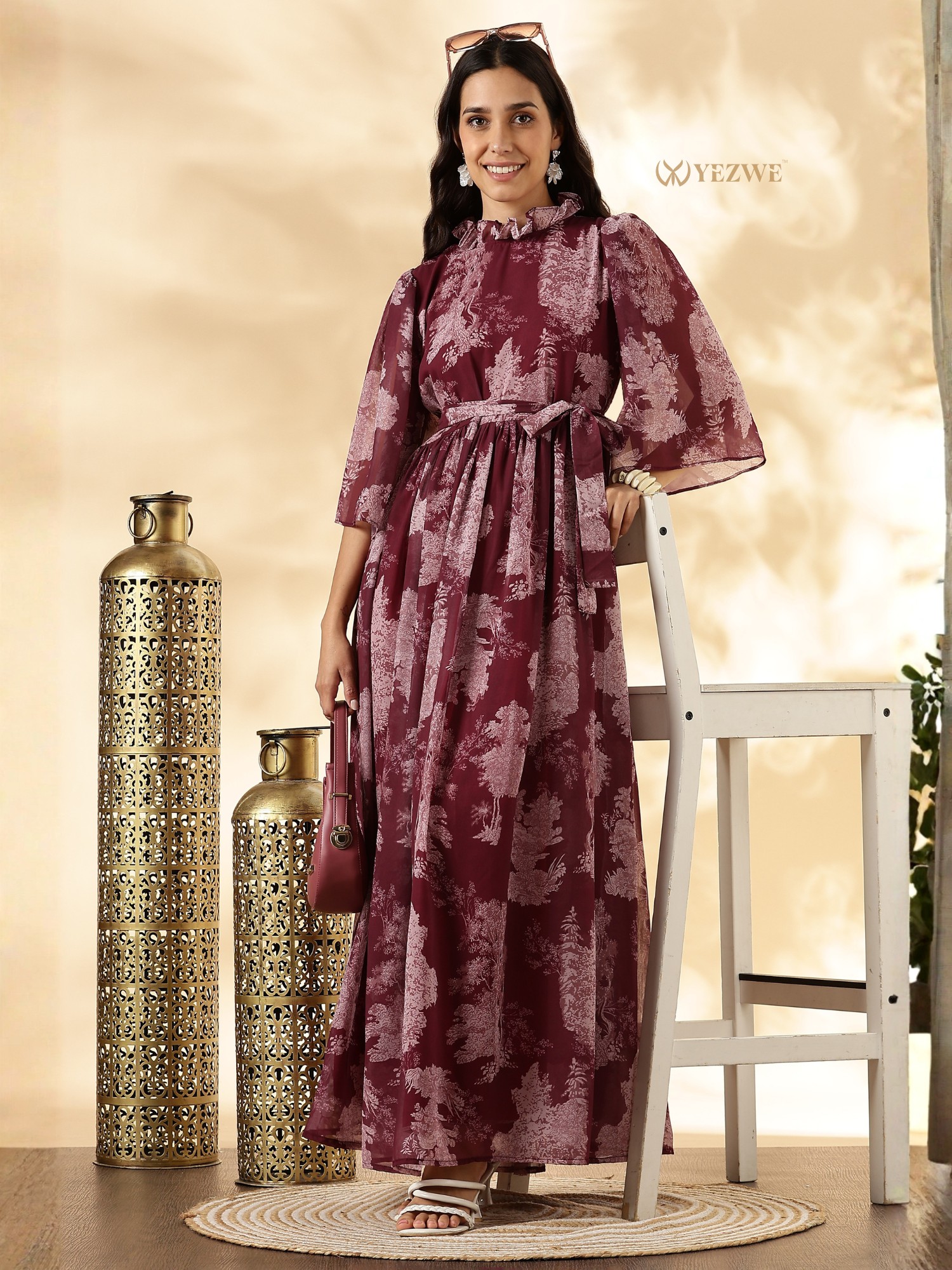 Elegant YEZWE modest maxi dress in maroon with flowing sleeves and a flattering tie waist