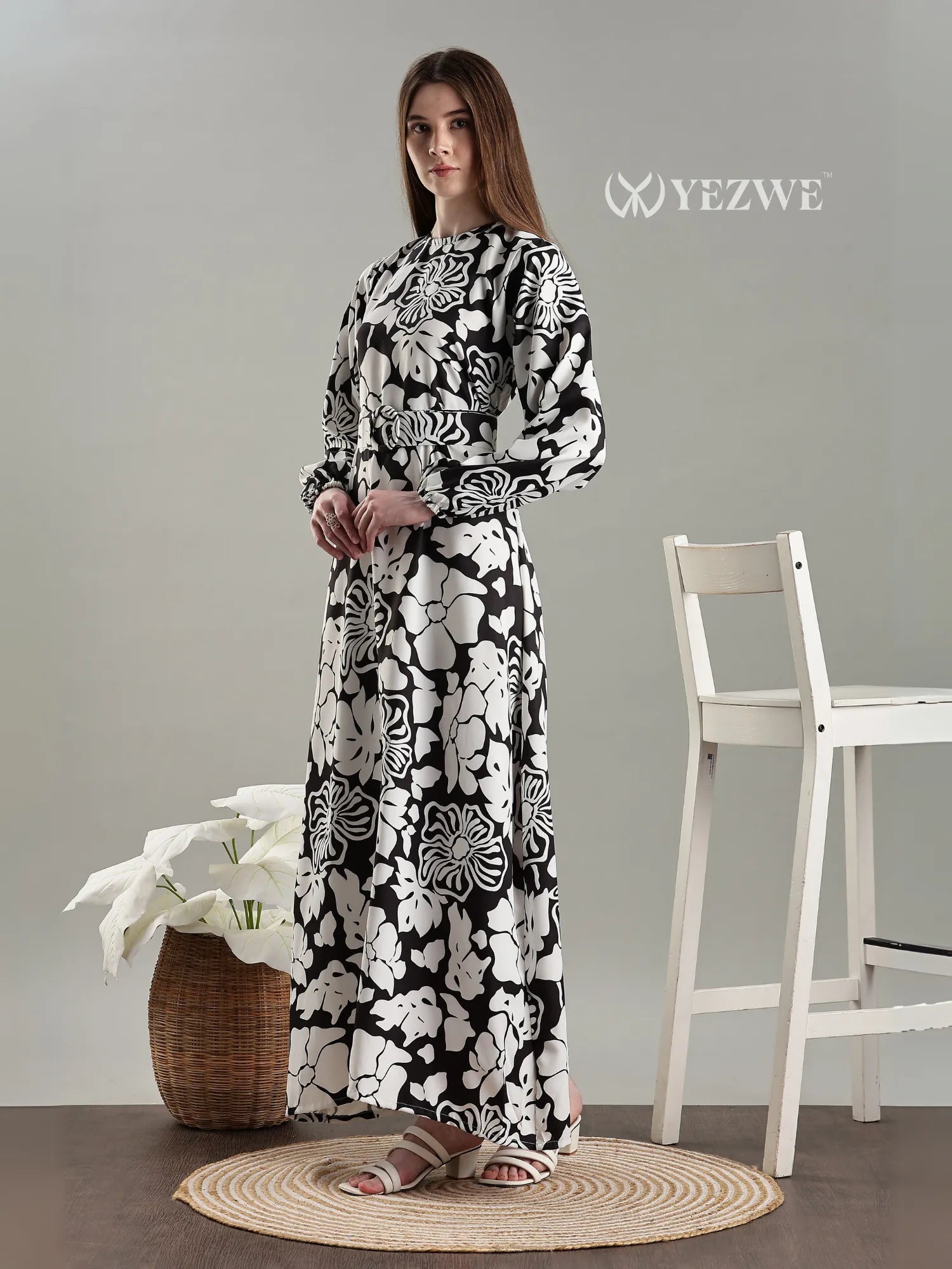 YEZWE Black And White Floral Full length Modest Maxi Dress featuring long sleeves and a flowy design