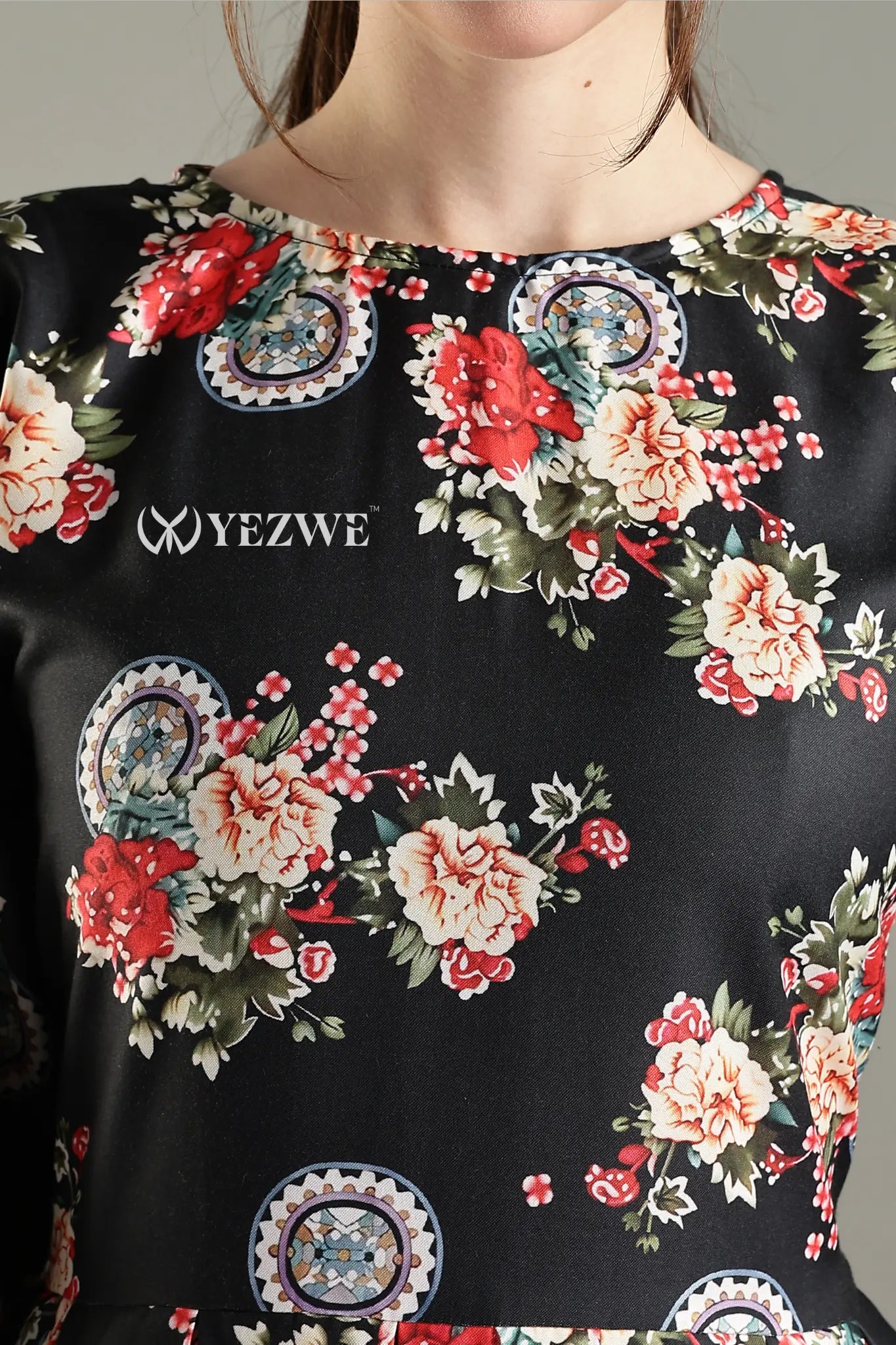 Black Floral Maxi Dress by YEZWE featuring vibrant floral patterns and a stylish neckline