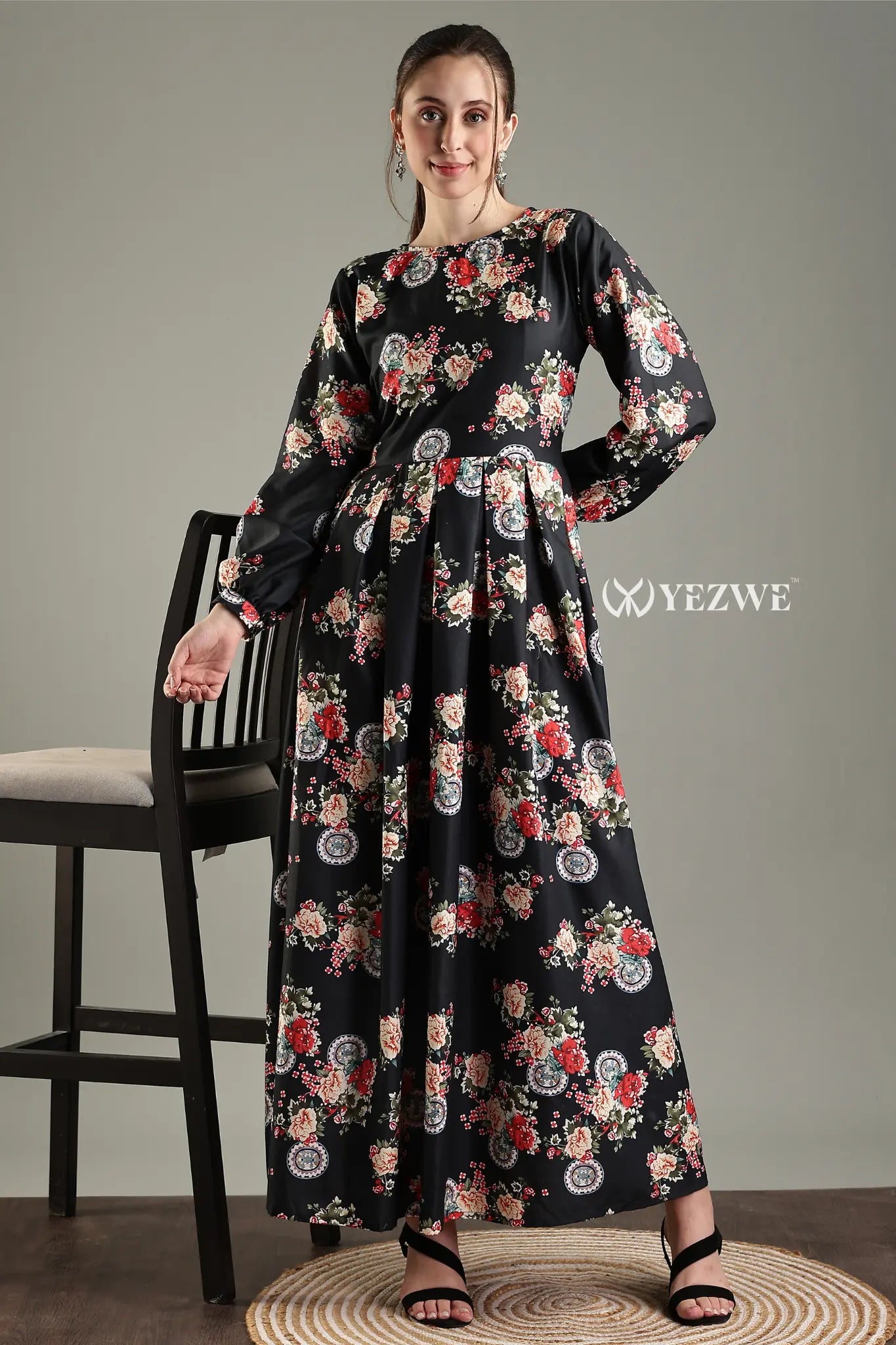 YEZWE Black Floral Maxi Dress featuring long sleeves and a flowy skirt, perfect for casual outings