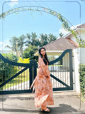 Yezwe brown floral georgette maxi dress displayed outdoors with a stylish silhouette