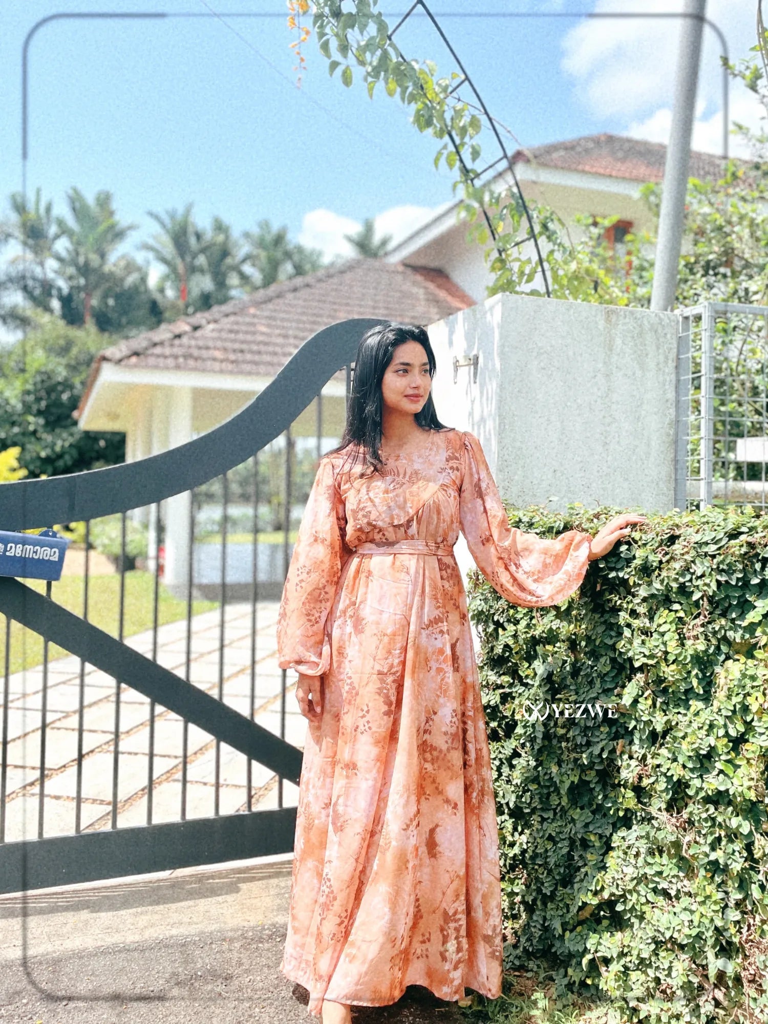 Yezwe brown floral georgette maxi dress with long sleeves, perfect for elegant casual wear