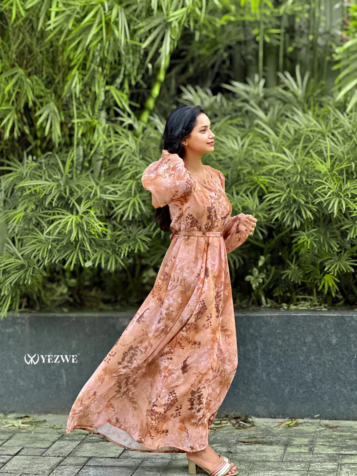 Yezwe brown floral georgette maxi dress with long sleeves and flowing design, perfect for warm weather occasions