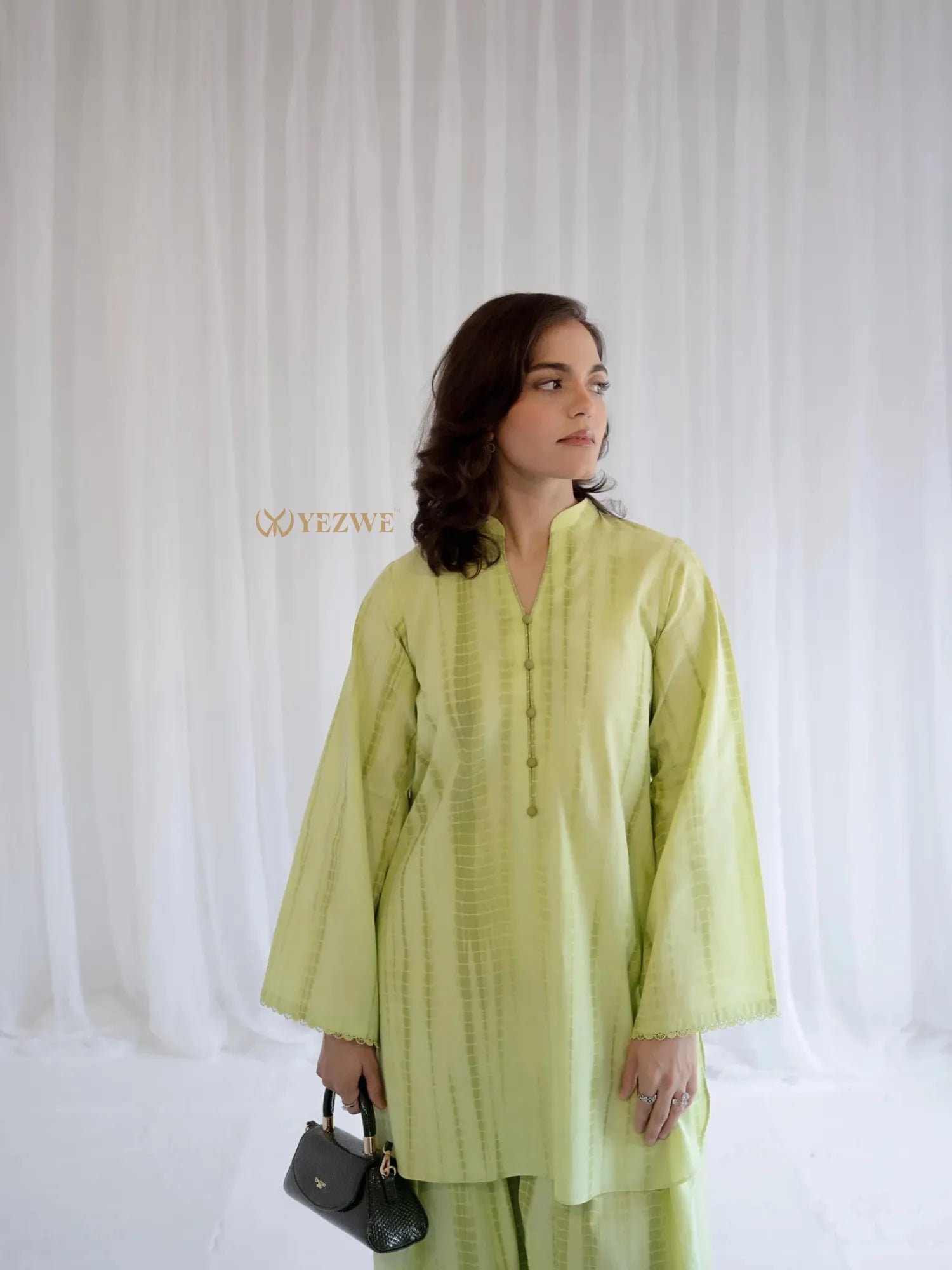 YEZWE Cotton Modest Co-ord Set in light green with long sleeves and button detail styled with black handbag