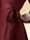 Close-up of a YEZWE customizable modest maxi dress featuring a tie waist and elegant sleeves