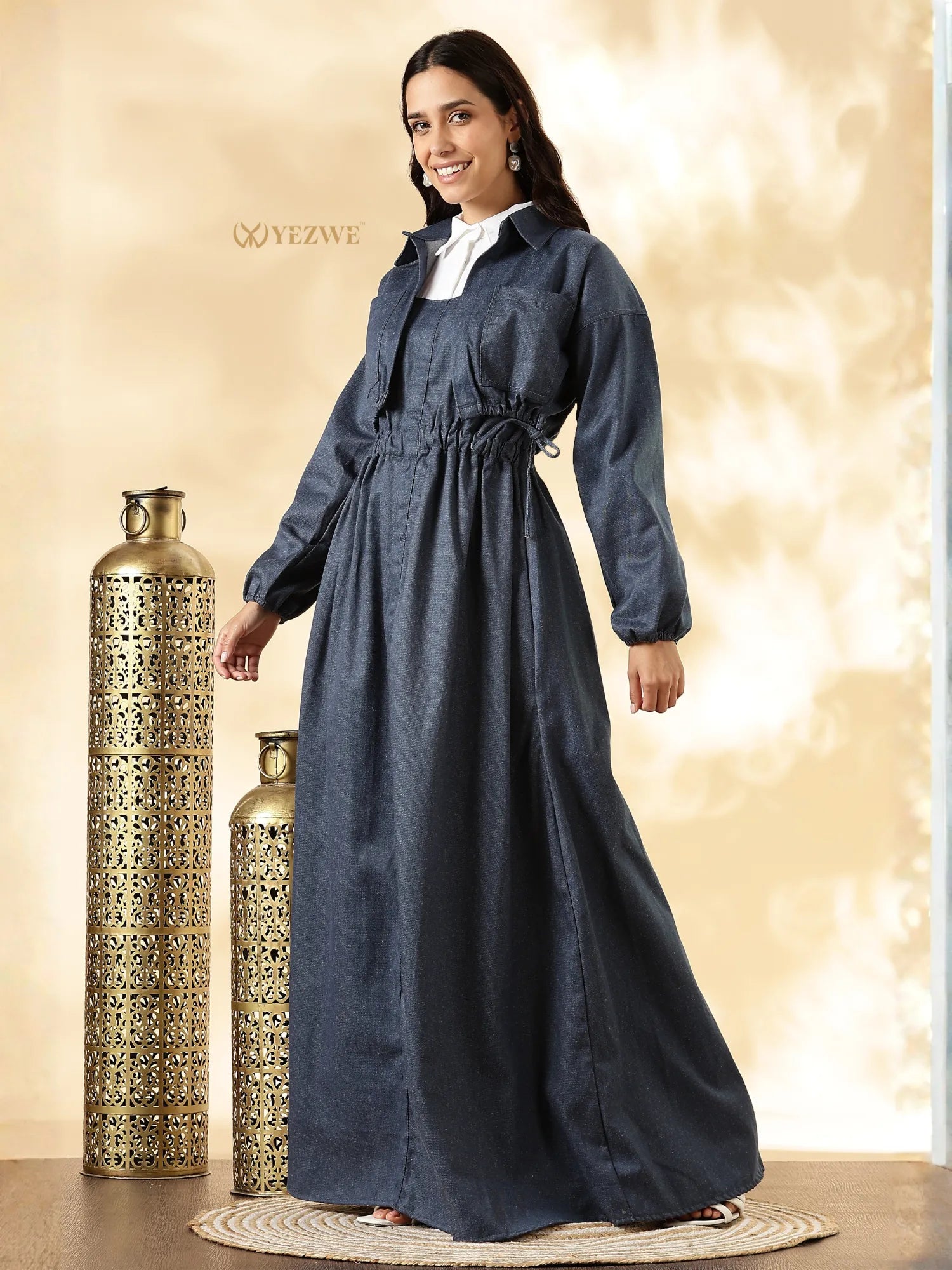 YEZWE denim maxi gown with shrug featuring a cinched waist and long sleeves, perfect for stylish layering