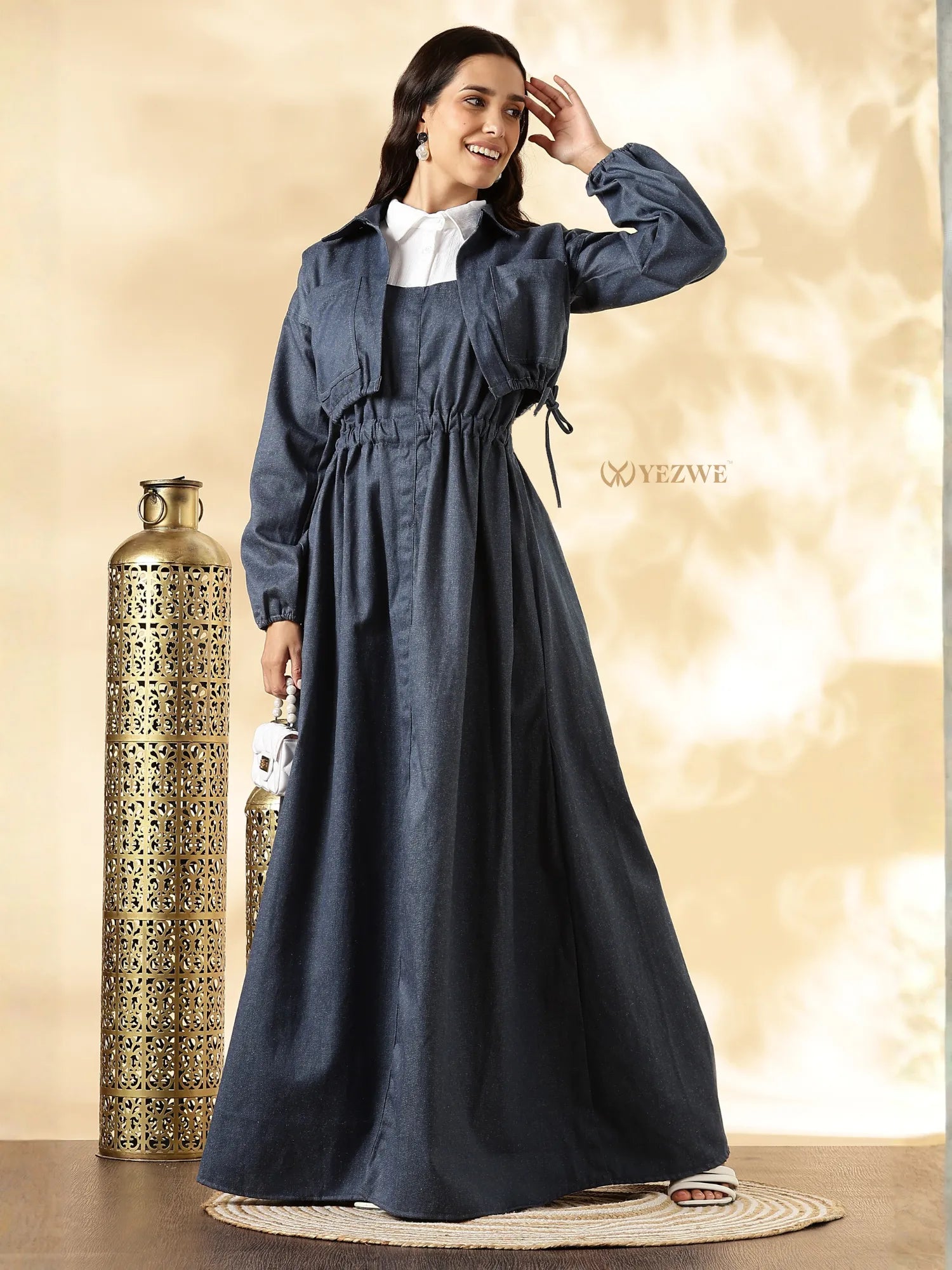 YEZWE denim maxi gown with shrug featuring a fitted waist and flowy skirt for elegant style