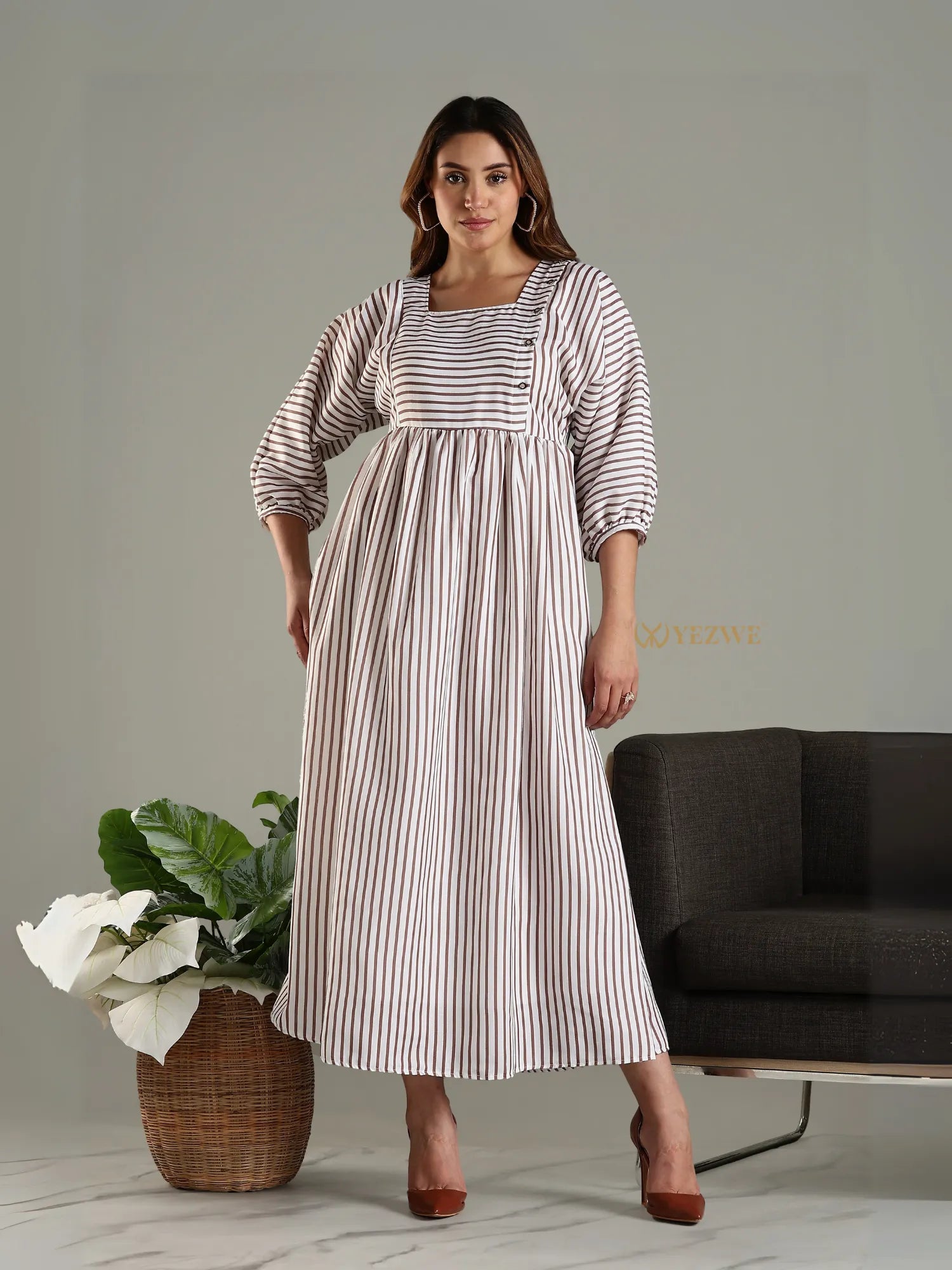 Yezwe striped maxi dress with three-quarter sleeves and square neckline worn by model