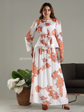 Yezwe modest co-ord set featuring a long floral skirt and matching long-sleeve top in white and orange