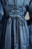 Detail of YEZWE modest in blue party maxi gown with elegant lace-up back design.