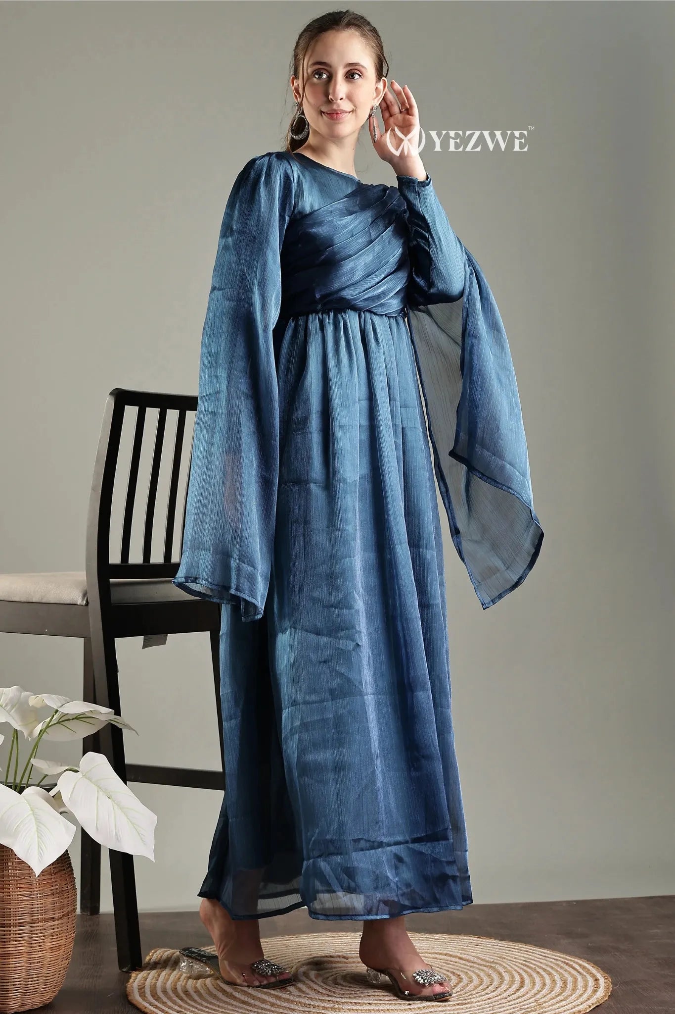 Elegant YEZWE modest in blue party maxi gown with flowing sleeves and a stylish design