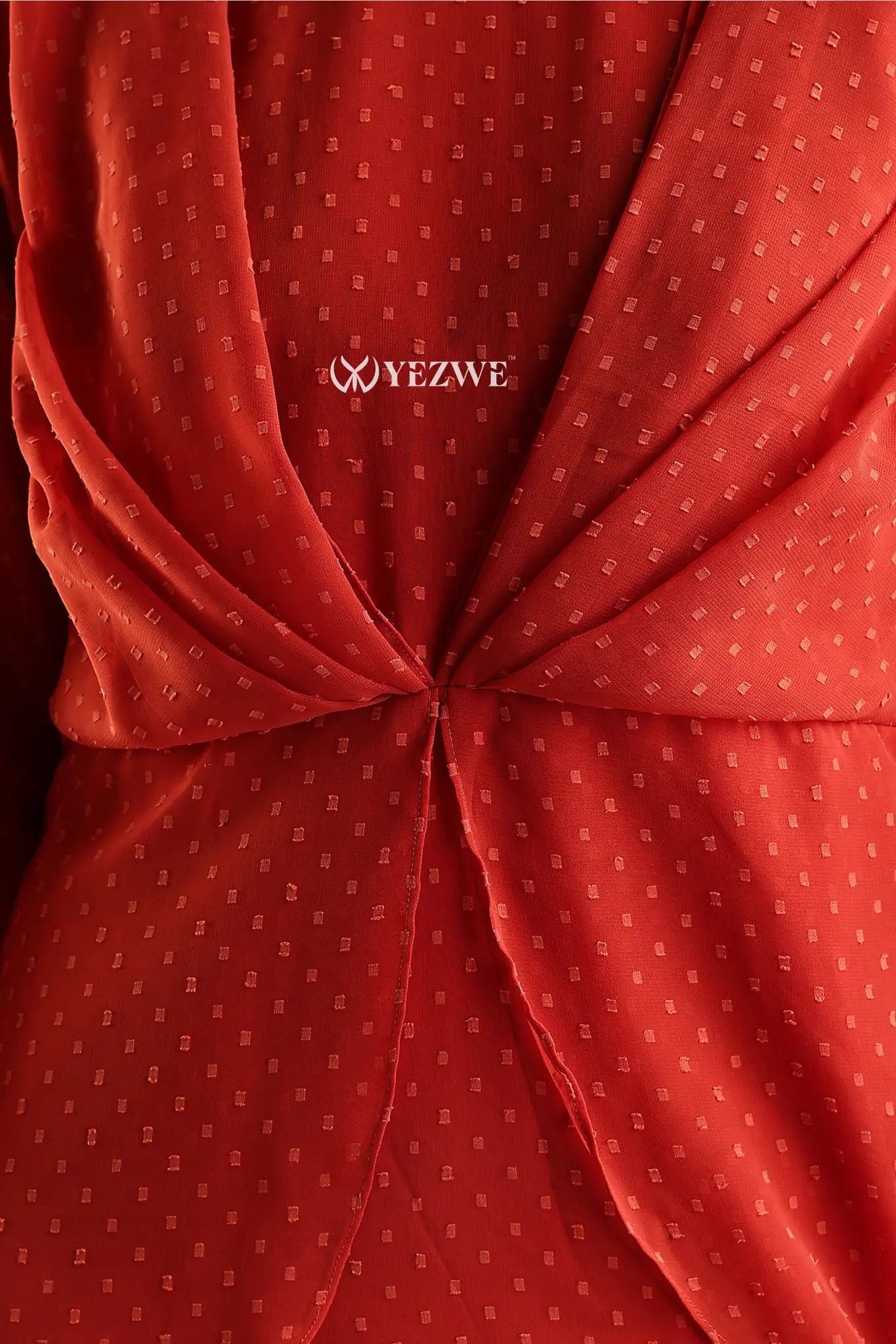 Back detail of YEZWE modest in orange georgette maxi dress featuring elegant draping design