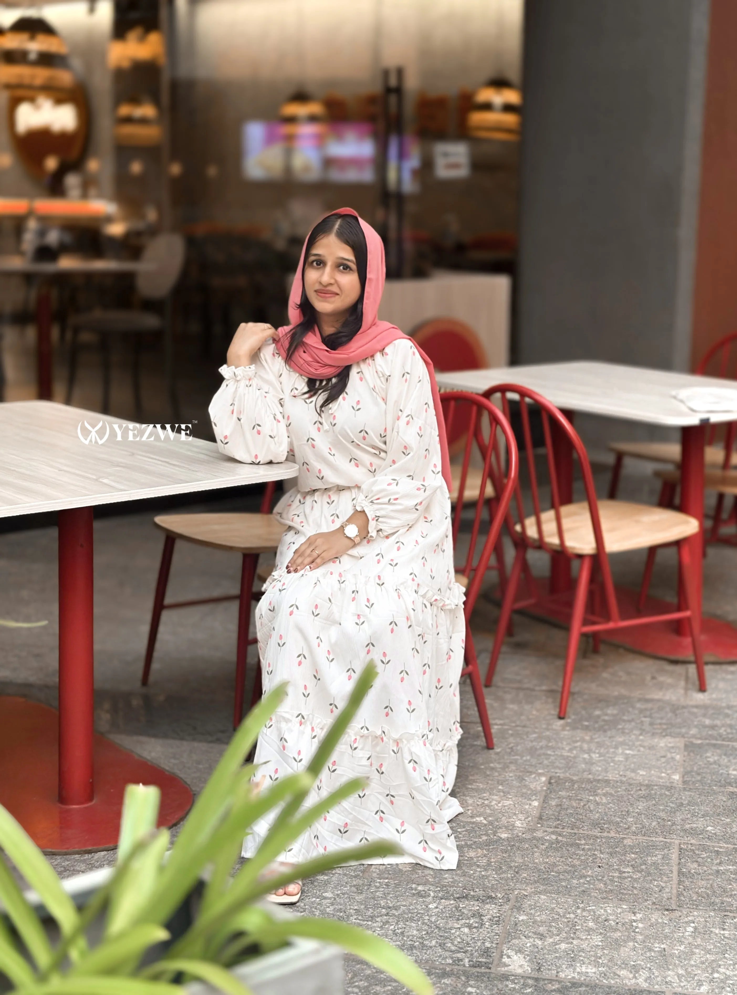 Yezwe modest Korean oneset outfit featuring a floral design, perfect for casual outings and elegant looks