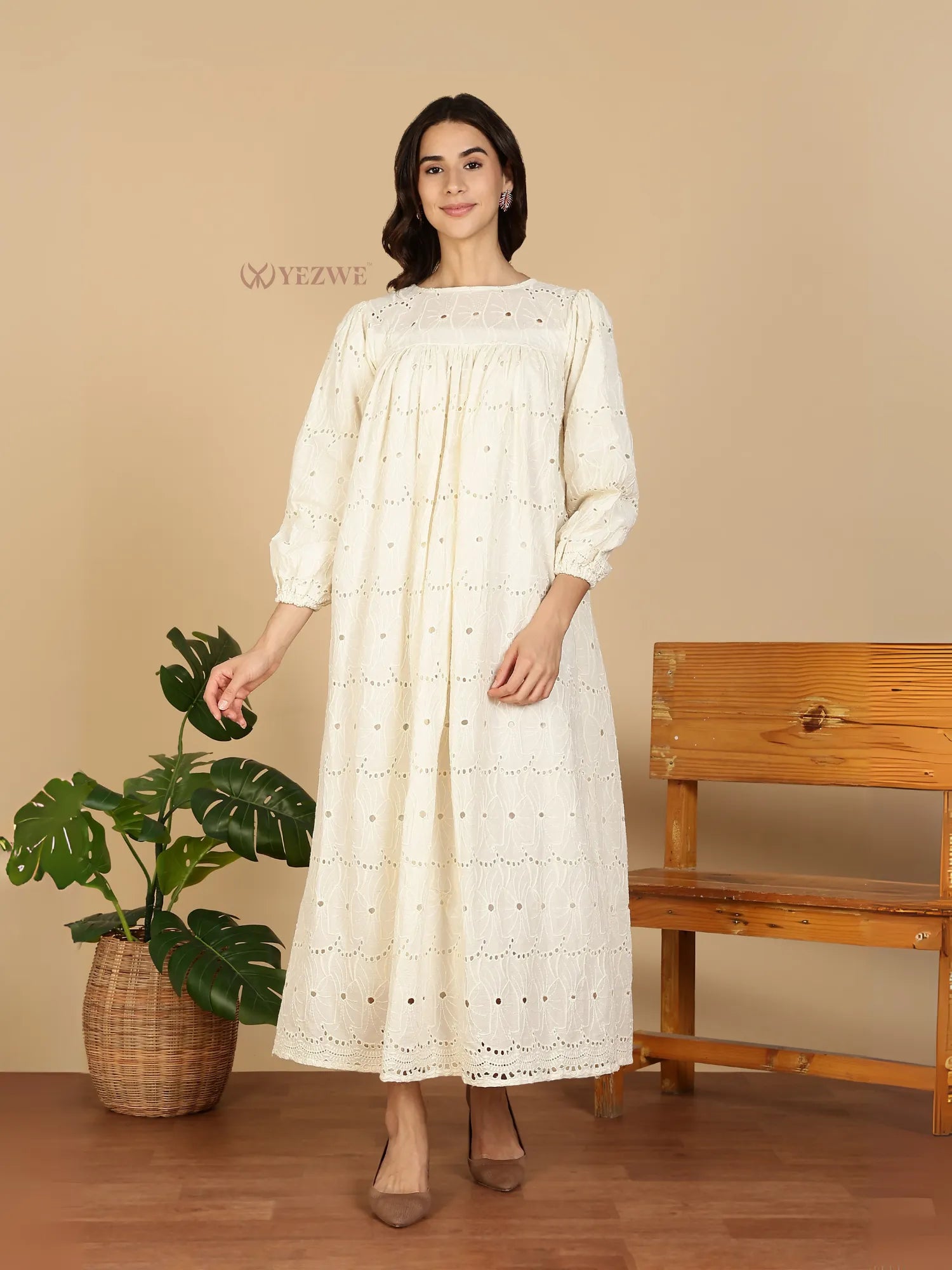 YEZWE Modest Maxi Dress in ivory eyelet cotton with long puff sleeves and pleated yoke