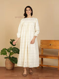 YEZWE Modest Maxi Dress in ivory eyelet cotton with long puff sleeves and pleated yoke