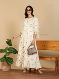 Yezwe Modest Maxi Dress cream with red heart print tie sleeves and ruffle hem model with sunglasses and brown handbag