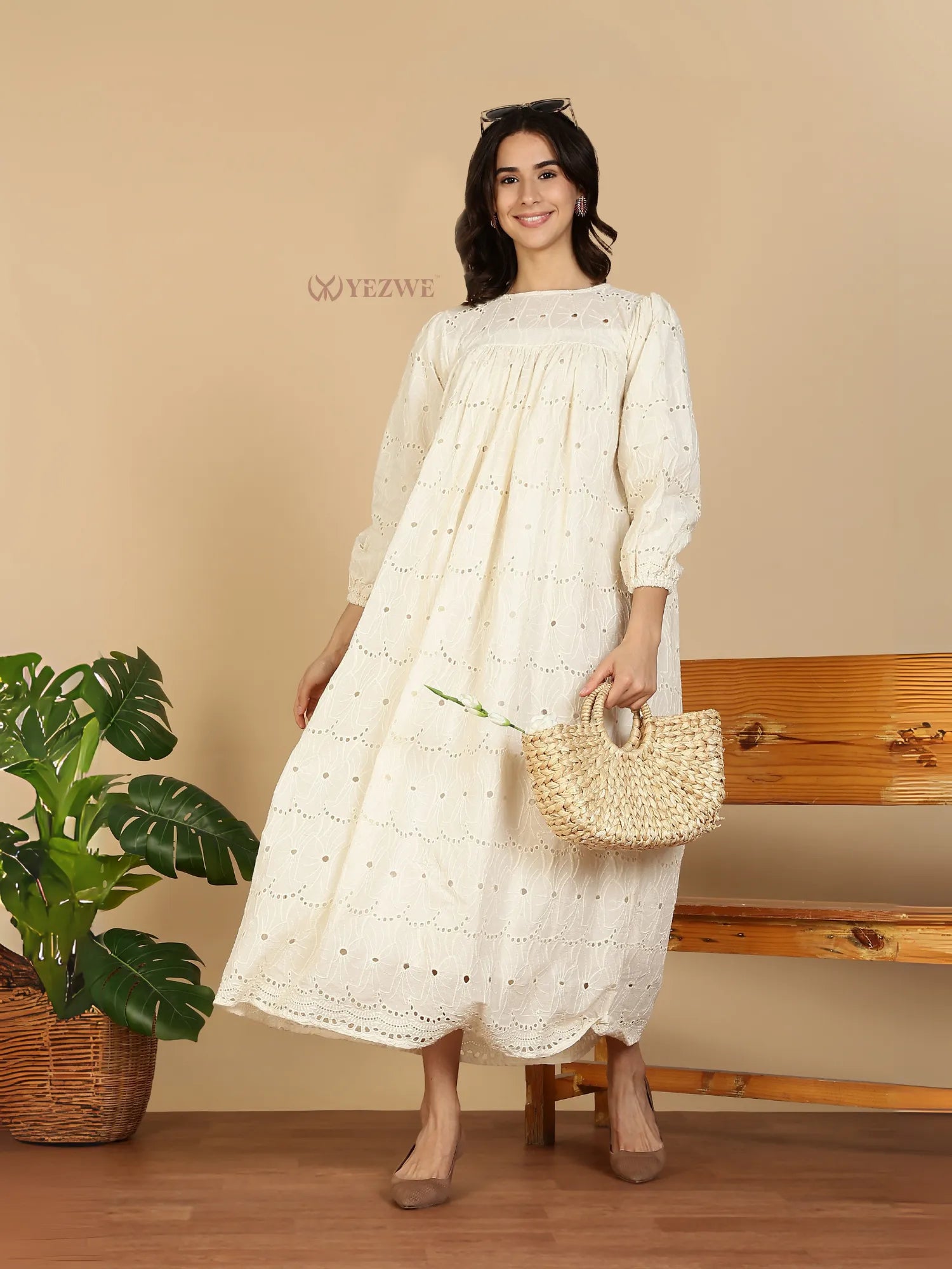YEZWE Modest Maxi Dress white eyelet cotton with long puff sleeves scoop neckline styled with straw bag