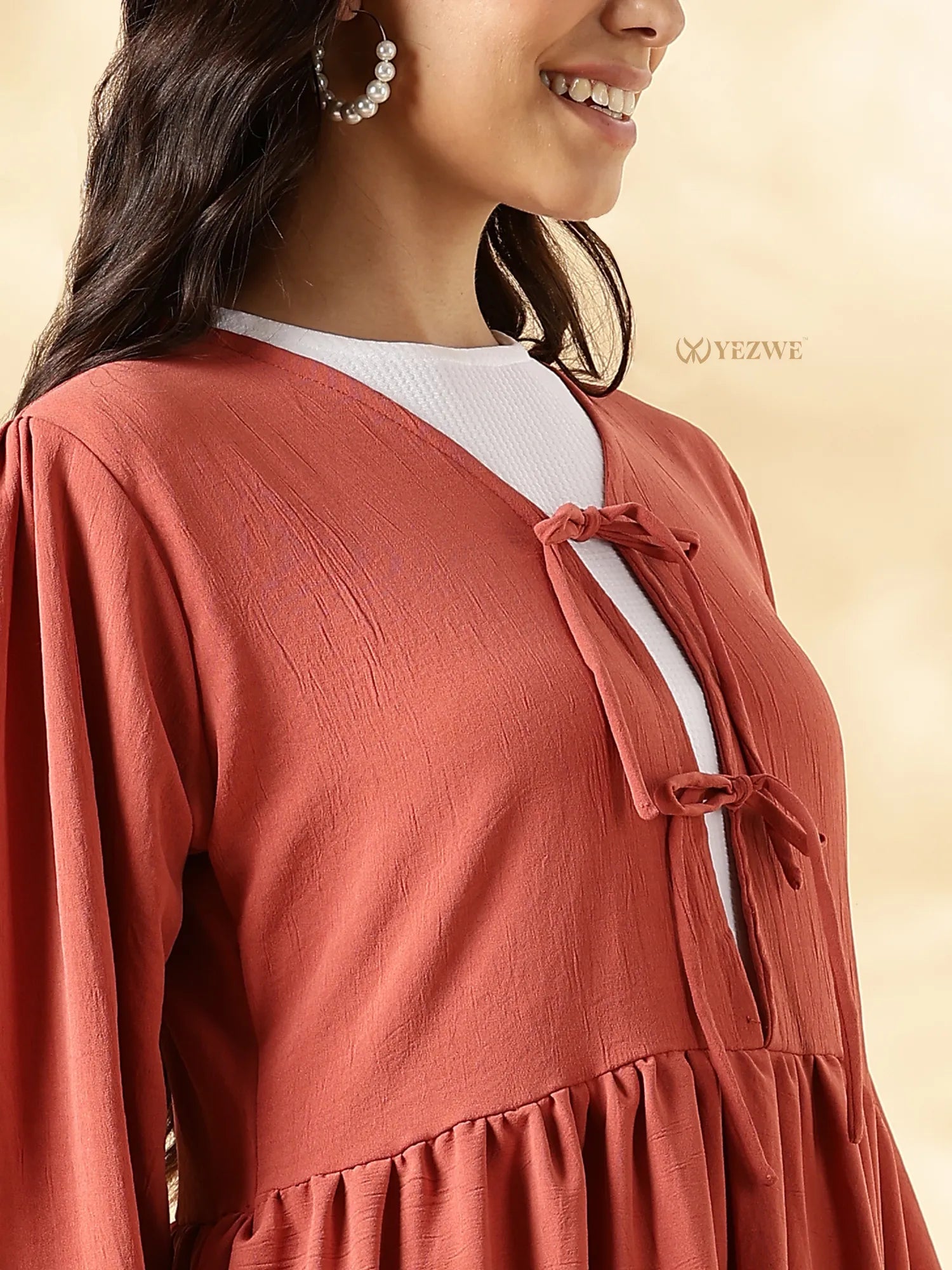 YEZWE Modest Maxi Dress in rust color featuring a stylish tie detail and flowing sleeves