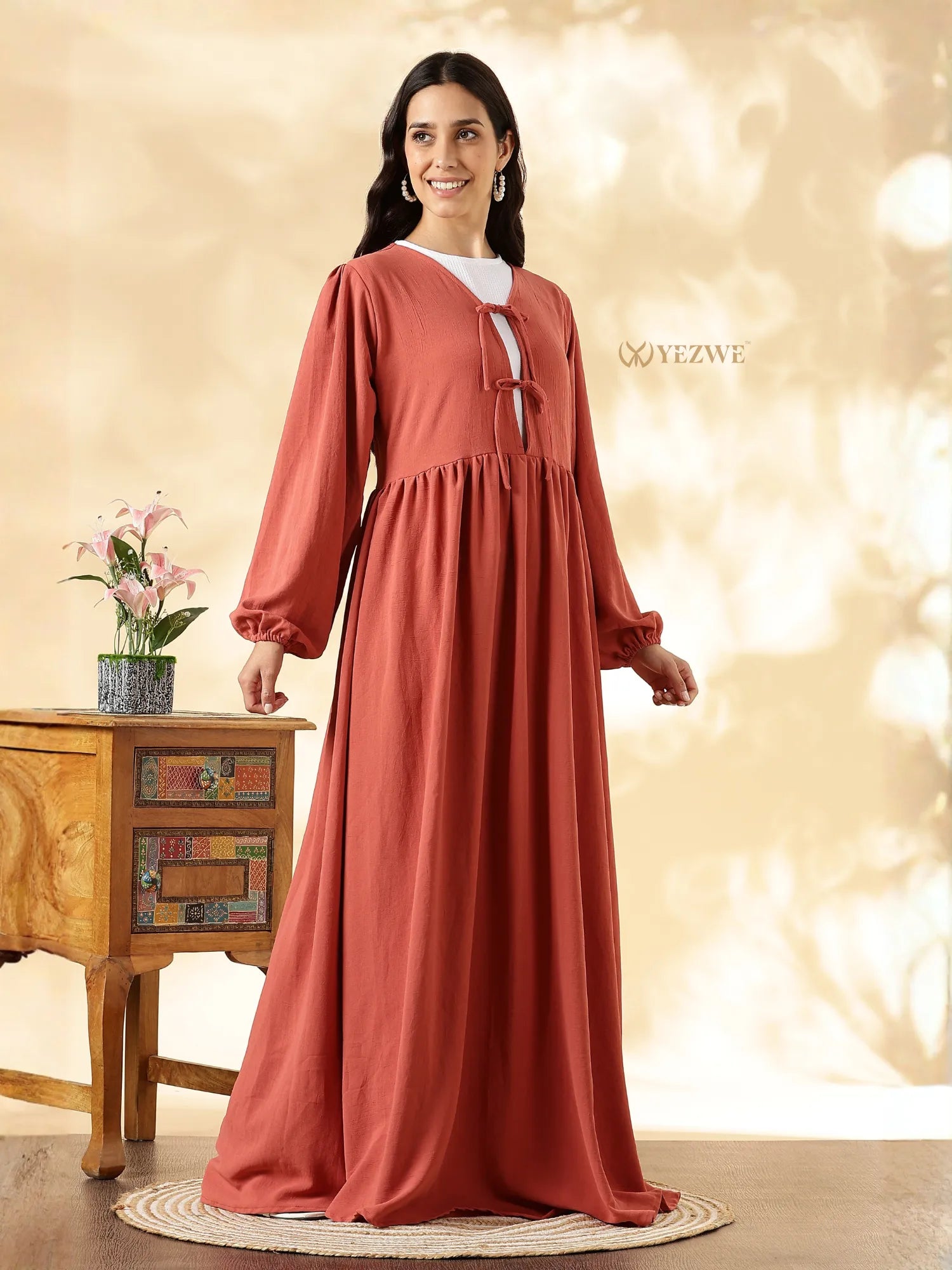 YEZWE Modest Maxi Dress in Rust Orange with Long Sleeves and Elegant Tie Detail