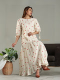Yezwe modest maxi dress in cream with red heart prints and three-quarter sleeves styled with brown heels