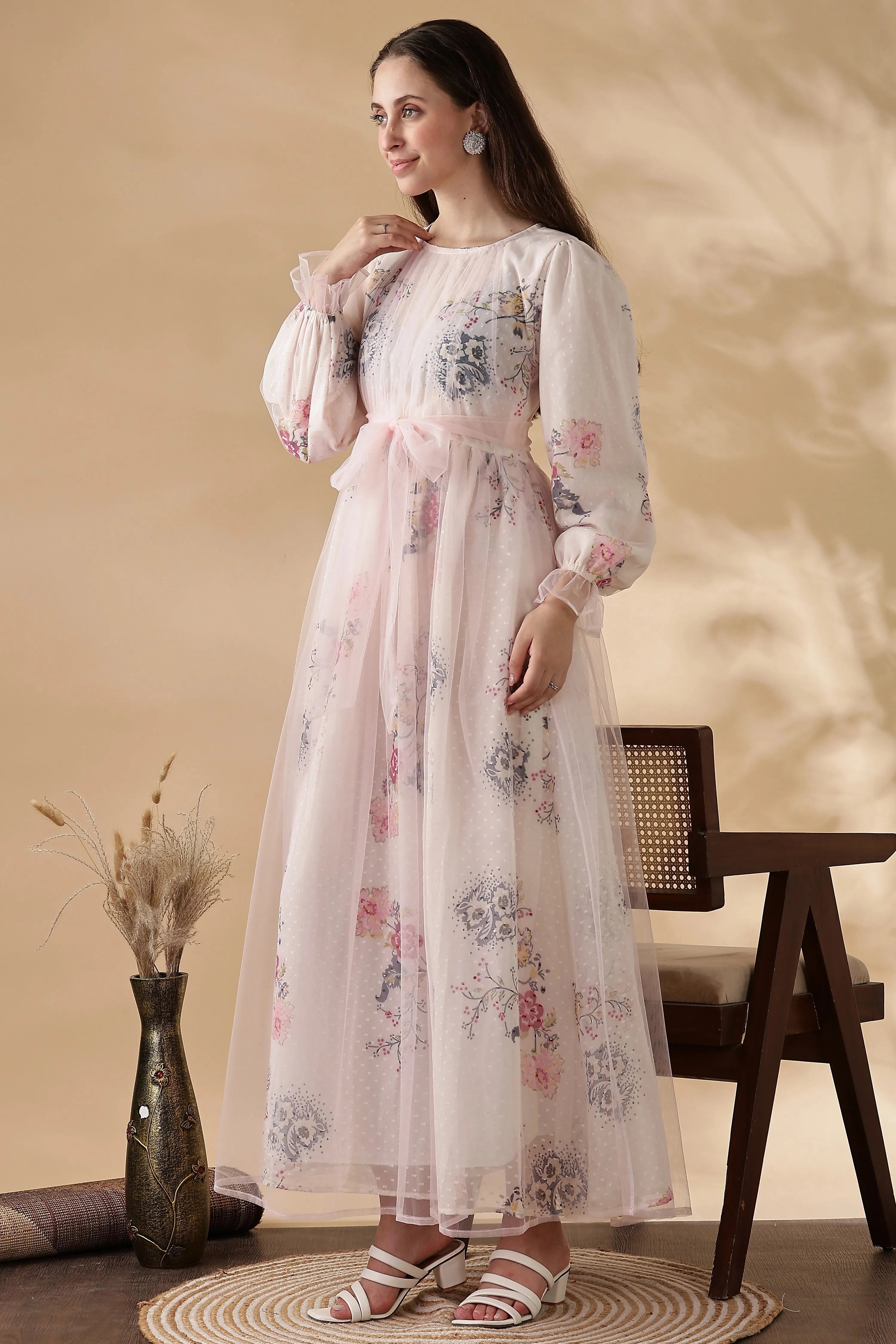 YEZWE Modest party dress for women featuring floral patterns and long sleeves in soft pink fabric