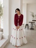 Pinterest Bow Detail White Flared Gown with Wine Cey Shrug | Yezwe Modest Wear in a bright indoor setting