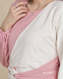 Pastel pink maxi dress by YEZWE featuring a stylish wrap design and textured fabric