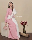 Pastel pink maxi dress from YEZWE with long sleeves and stylish color block design