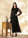 Elegant YEZWE Schiffli Maxi Dress in black with long sleeves and a belted waist for a stylish look