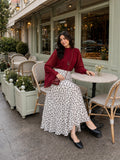 YEZWE Wine Red Fusion Mock-Neck Top & Polka Dot Co-ord Style Co ord worn at a cafe with elegant seating