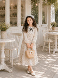Yezwe junior girls off white polka dot georgette dress with bow detail front view