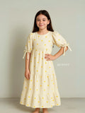 a girl stands in Yezwe Miniature Yellow Love Embroidered Kora Modest Maxi Dress For Junior Girls