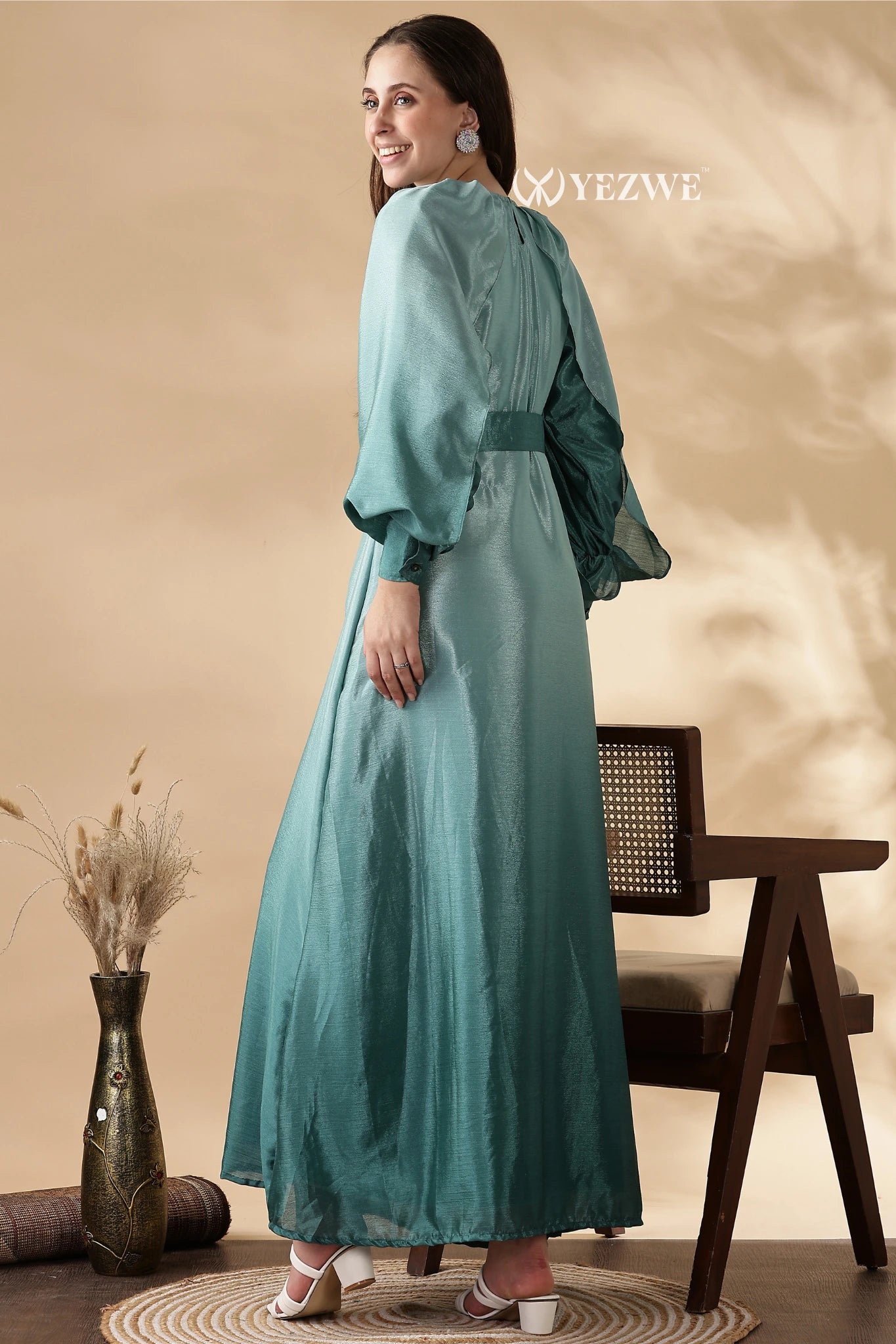 Affordable modest green maxi dresses online showcasing a flowing design and elegant sleeves