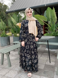 Yezwe black georgette maxi dress with geometric patterns and long sleeves, perfect for stylish outings
