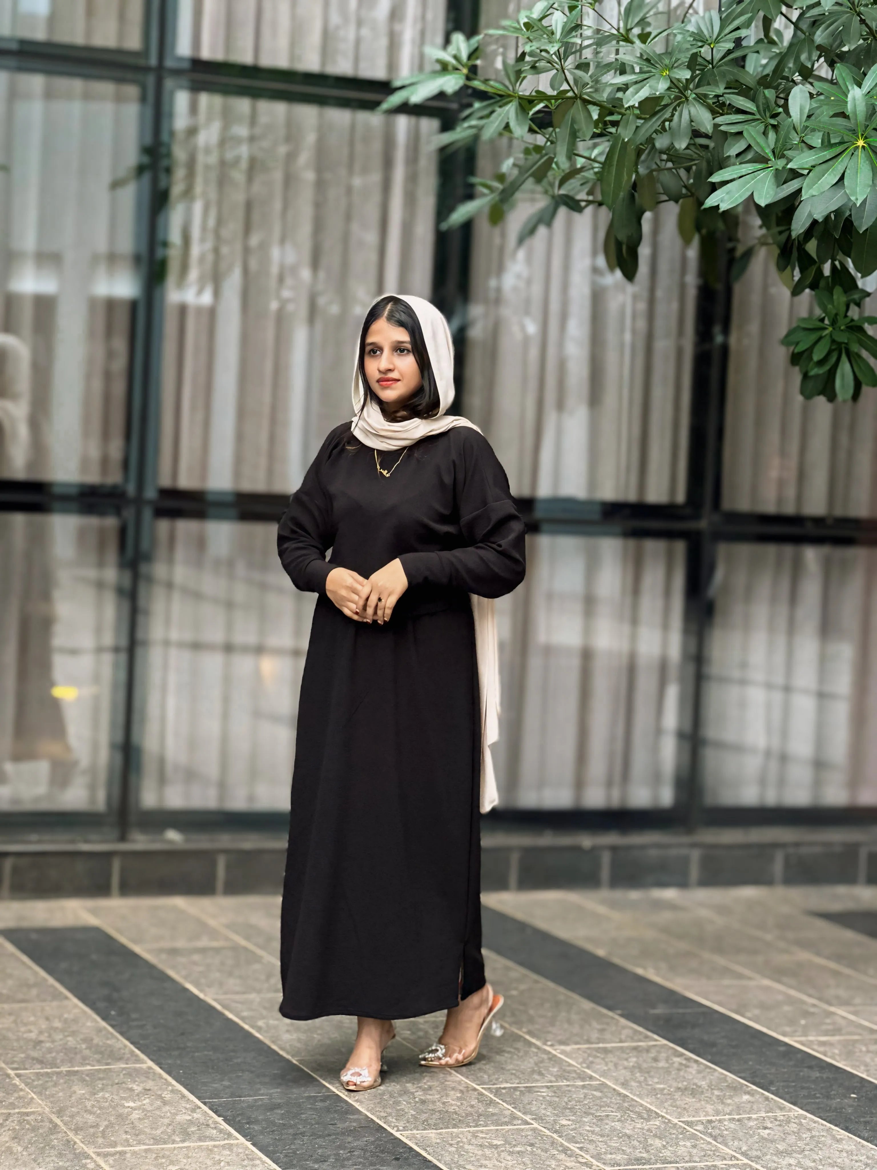 Yezwe black Turkish top and skirt set featuring a long elegant design and stylish details