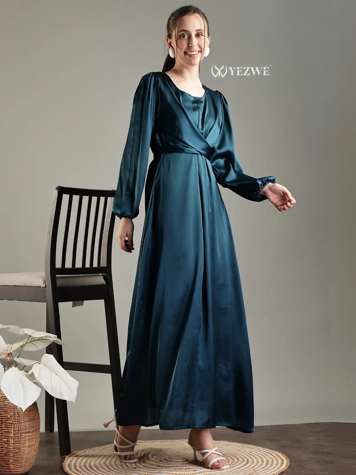 YEZWE blue satin flare modest gown with elegant long sleeves and a flattering wrap design