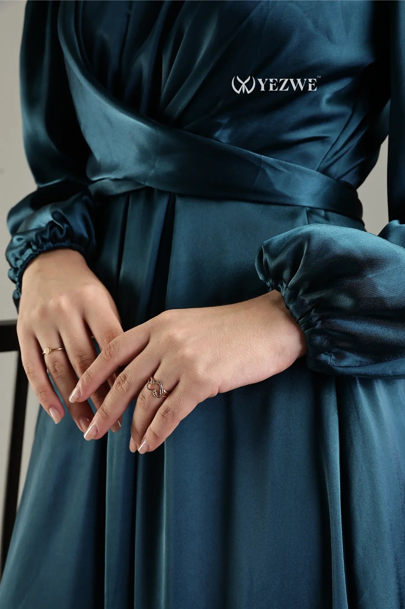 YEZWE blue satin flare modest gown with long sleeves and elegant waist belt
