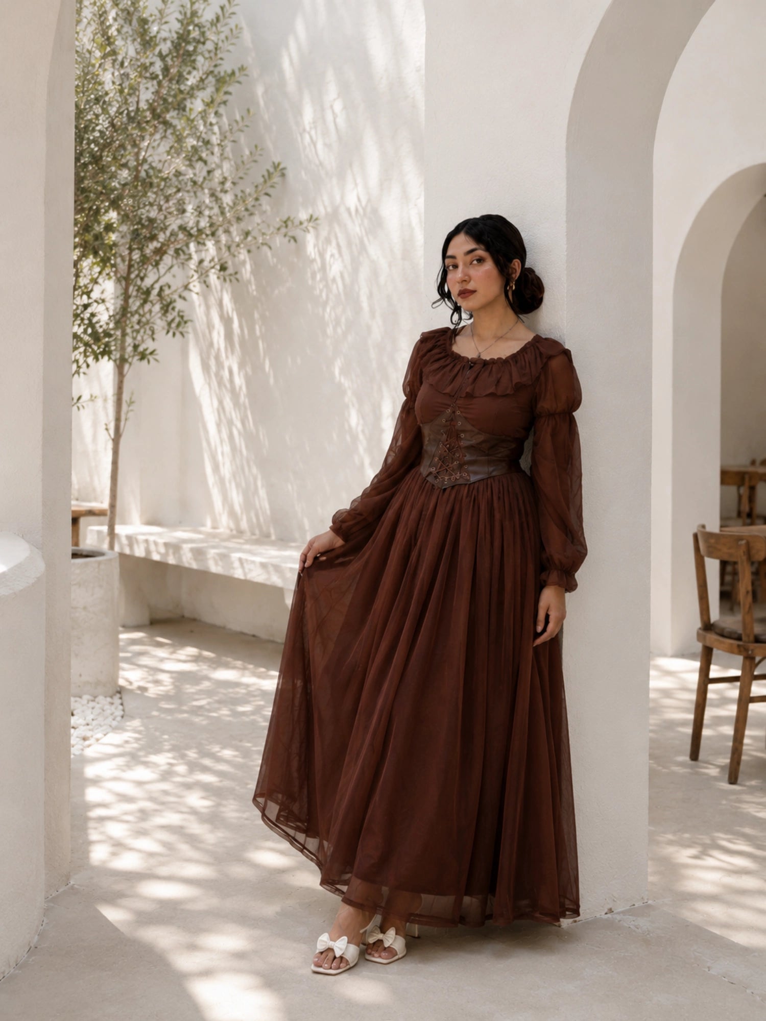 YEZWE brown corset maxi dress with long sleeves and a flowing skirt, perfect for elegant occasions