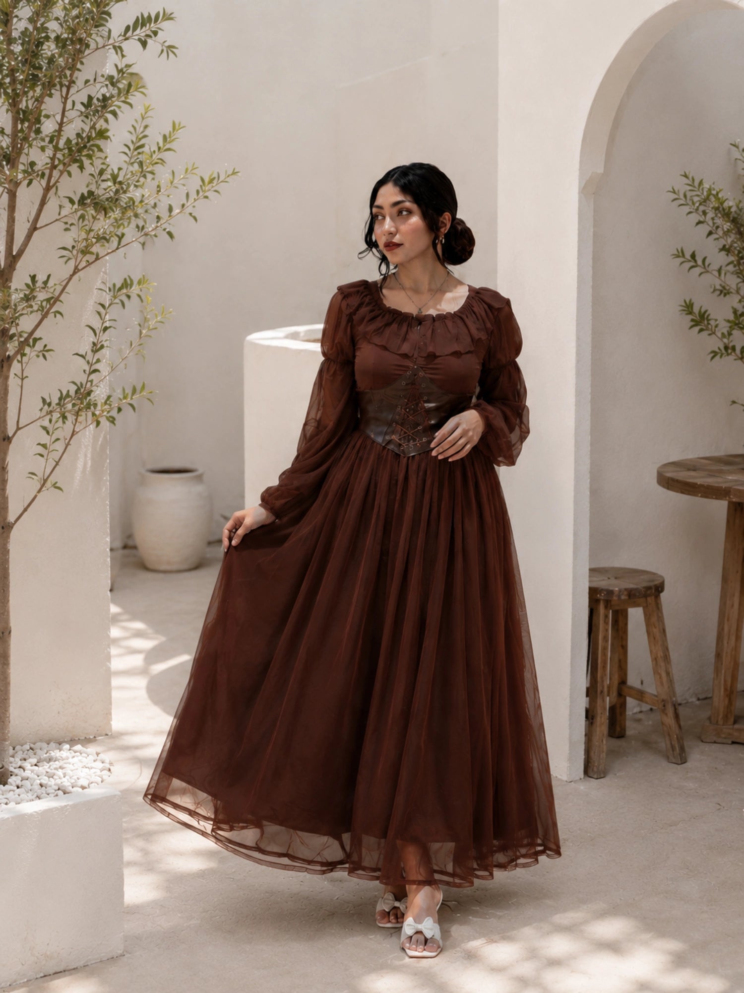Brown corset maxi dress from YEZWE with puff sleeves and flowing skirt for elegant occasions