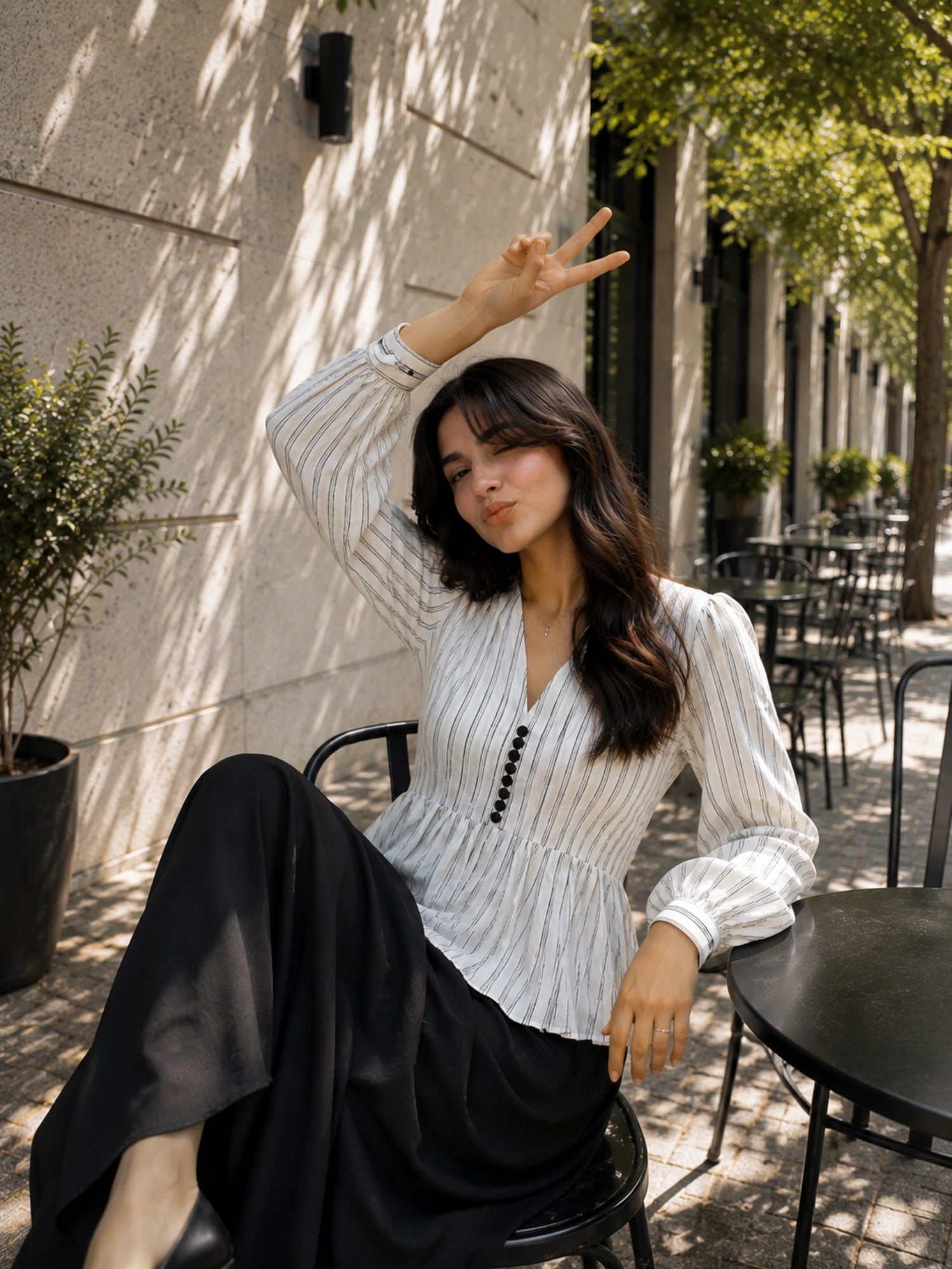 Classic Striped Peplum Top & Black Maxi Skirt Co-ord Set for Women styled outdoors with a relaxed pose